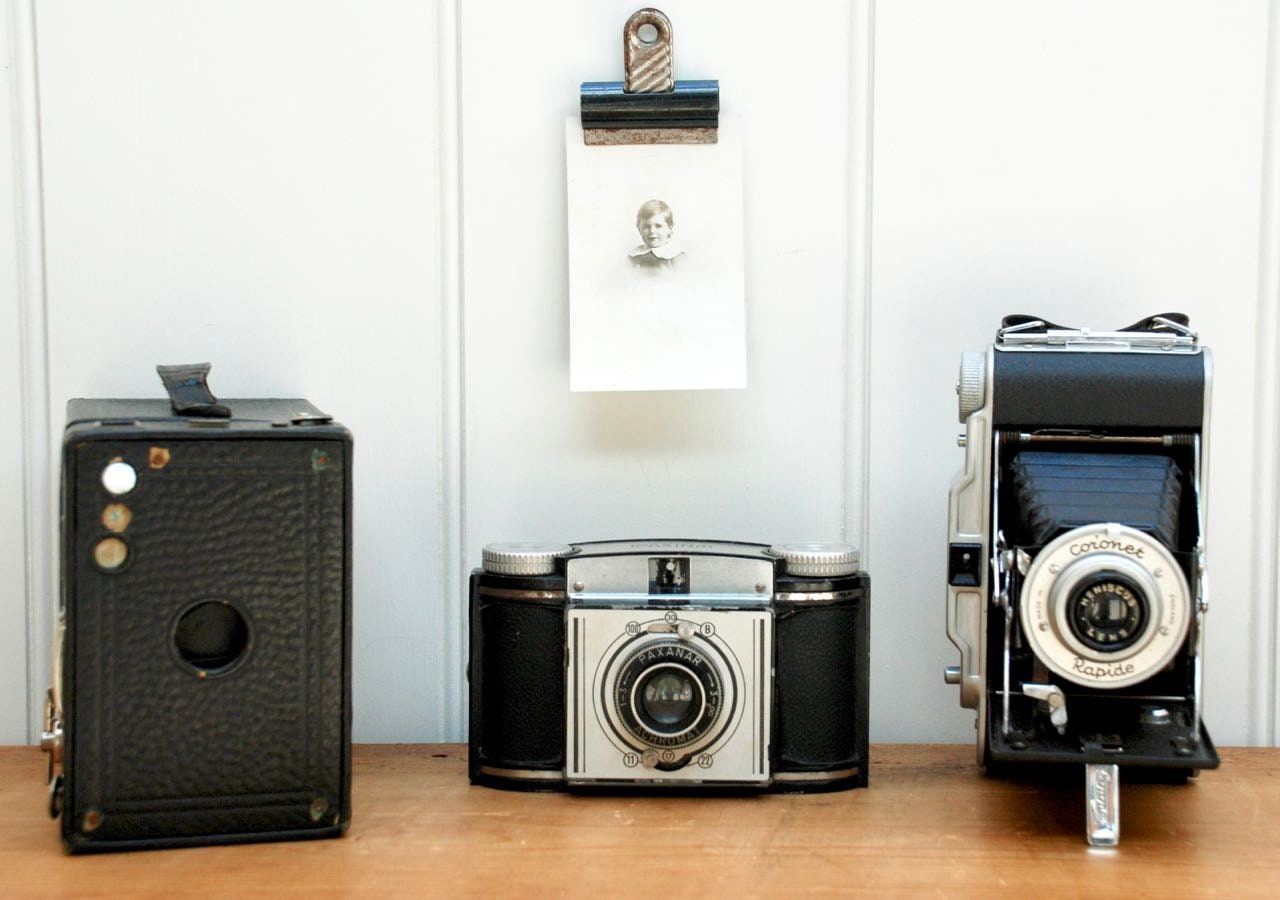 A collection of antique and vintage cameras for display Kodak Etsy