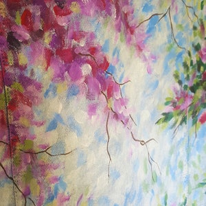 May include: An abstract painting featuring a floral design with pink, purple, and red blossoms. The artwork has a light blue and white background, with brown branches. The painting is on a textured canvas.