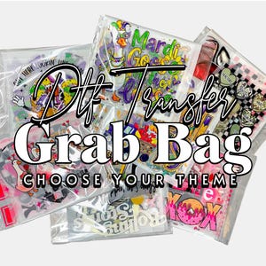May include: DTF Transfer Grab Bag with various themed designs in clear plastic packaging. The text "CHOOSE YOUR THEME" is visible. Designs include Mardi Gras, hearts, and donuts.
