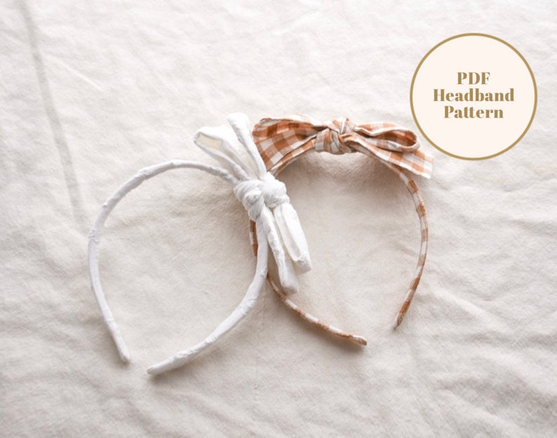 May include: Two headbands with fabric bows. One headband is white with a white bow and the other is brown with a brown and white gingham bow. The text "PDF Headband Pattern" is in a circle in the upper right corner of the image.