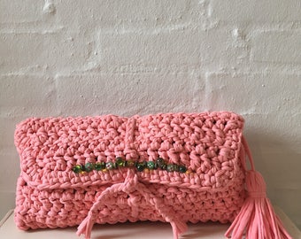 Lovely peach clutch with green glass beads