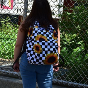 checkered backpack with sunflowers