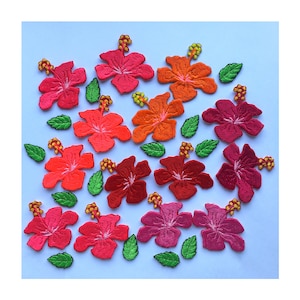 May include: Assortment of colorful embroidered hibiscus flower patches in red, orange, pink, and green.
