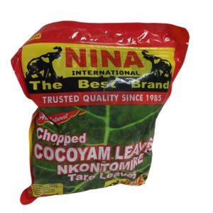 May include: A red, yellow, and green bag of frozen chopped cocoyam leaves. The bag has a picture of an elephant and the text "NINAS INTERNATIONAL The Best Brand TRUSTED QUALITY SINCE 1985".