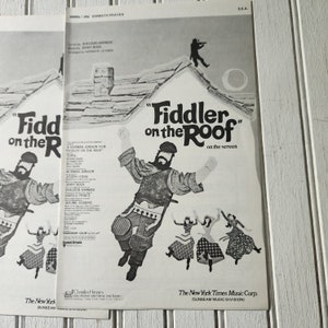 May include: Two vintage sheet music covers for "Fiddler on the Roof" musical. The covers are black and white, featuring illustrations of characters and the title. The text includes the title, credits, and the phrase "on the screen."