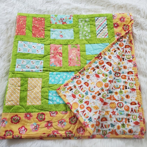 Gorgeous Handmade Patchwork Quilt - Child's Fabric Backing - Brightly Colored Florals and Patterns - Measures 40" Square