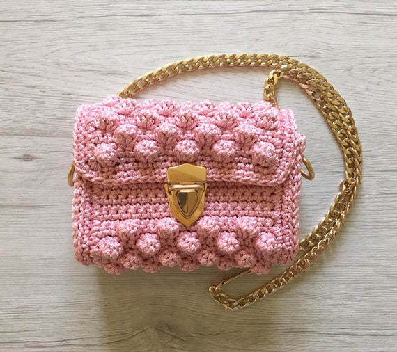 small pink clutch bag