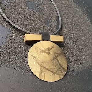 gold circle pendant necklace, gold & black statement necklace, gold contemporary necklace, art design jewelry, gold avant garde necklace