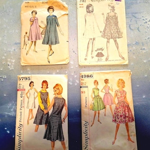May include: Four vintage Simplicity and Weigel's sewing pattern envelopes. The patterns feature illustrations of dresses and include text such as "Bust", "Miss", and "Jiffy". The envelopes are aged with yellowed paper.