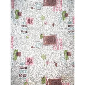May include: A vintage fabric featuring a repeating pattern of geometric shapes and abstract designs. The pattern includes squares, rectangles, and diamond shapes in shades of brown, pink, green, and blue on a white background.