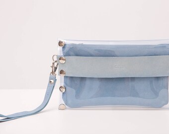 Bolso clutch de cuero y vinilo