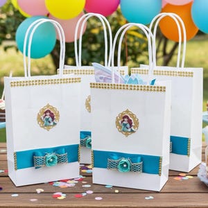 Princess Ariel Birthday party favor gift bags. This cute favor bag is great for parties, birthdays, and for small gifts. These favor bags are designed based off of Disney Ariel .