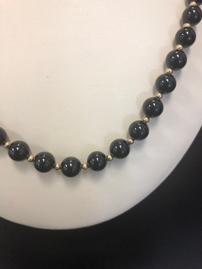 Black onyx and gold accent beaded necklace 29 long