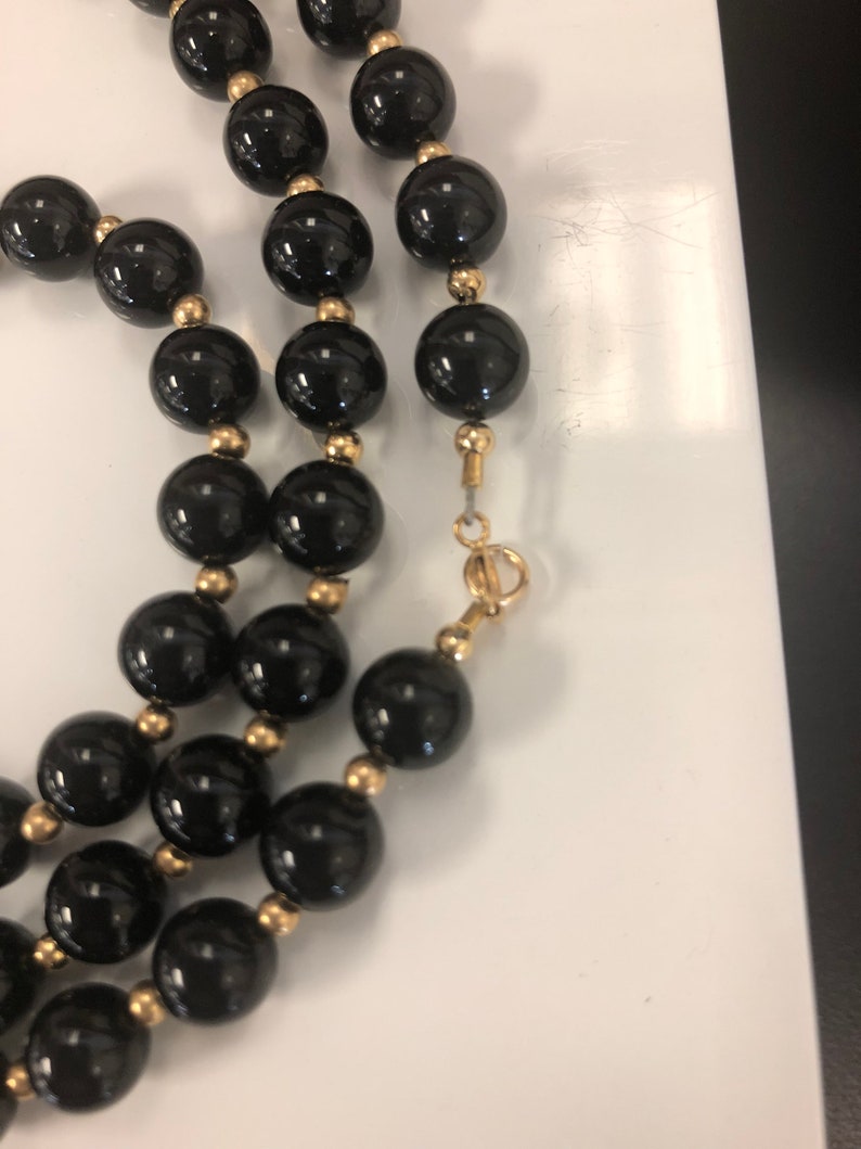 Black onyx and gold accent beaded necklace 29 long