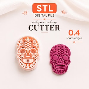 Può includere: Un tagliapasta per argilla polimerica a forma di teschio color arancione chiaro e una forma di teschio pressata color rosa scuro. Il testo recita STL DIGITAL FILE polymer clay CUTTER e 0.4 sharp edges. È un file digitale per un tagliapasta.