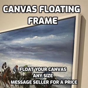 May include: A white canvas floating frame with a blue and white abstract painting inside. The frame is made of wood and has a clean, modern look. The text "FLOAT YOUR CANVAS ANY SIZE MESSAGE SELLER FOR A PRICE" is printed on the bottom of the frame.
