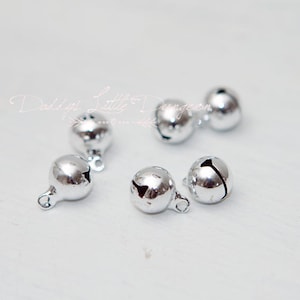 Add A Small Silver Jingle Bell Charm to Your Collar