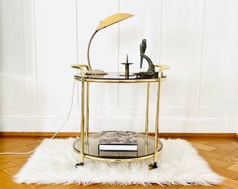 Round bar trolley made of brass and smoked glass, Germany 80s