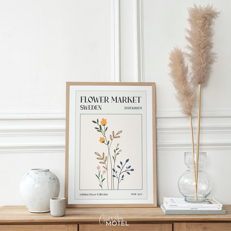 May include: A minimalist poster with a floral illustration in shades of yellow, orange, pink, and green. The poster has the text "Flower Market Sweden Stockholm" and "Exhibition Flower Collection 1998 No.9".
