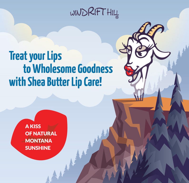May include: A cartoon goat with red lipstick stands on a cliff overlooking a forest. The text "Treat your Lips to Wholesome Goodness with Shea Butter Lip Care!" is in the upper left corner. The text "A Kiss of Natural Montana Sunshine" is in a red heart shape in the lower left corner.