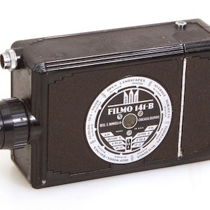 Kamera filmowa Art Deco Vintage Bell & Howell Filmo 141-B 16 mm z obiektywem 16 mm 1.6