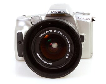 35 mm 学生用カメラ、28-90 mm レンズ、フィルム、マニュアル付き
