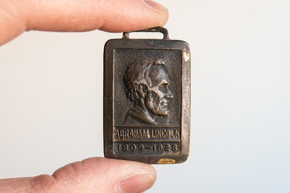 Abraham Lincoln Brass Plate - image 1