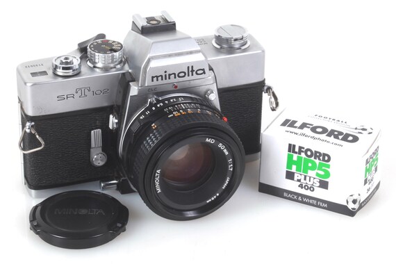 Minolta Manual Film Camera w/ 50mm f/1.7 Lens & Film, Meter Works