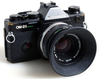 Olympus OM-4 TI with 50mm f/1.8: A Compact Film Powerhouse – Dutch|Thrift