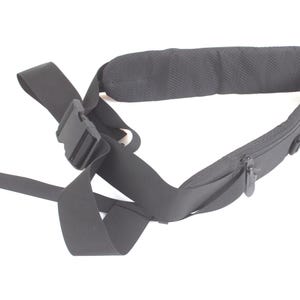 May include: Black waist pack with an adjustable strap and a zippered pocket. The pack features a plastic buckle closure and a padded section for comfort. The design is simple and functional, suitable for carrying essentials.