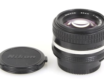 Obiektyw Nikon 50 mm 1.4 Prime AI-S z dekielkami