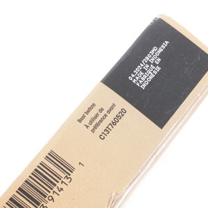 May include: A close-up of a cardboard package with text. The text includes "Best before", "04.2024/2803MD", and "MADE IN INDONESIA". A barcode is visible on the side of the package.