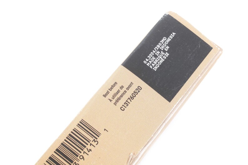 May include: A close-up of a cardboard package with text. The text includes "Best before", "04.2024/2803MD", and "MADE IN INDONESIA". A barcode is visible on the side of the package.