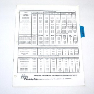 May include: A white sheet of paper with detailed specifications for cameras, tripods, and ballheads. The document includes tables with various technical data, such as dimensions, weights, and filter sizes. A blue tab is visible on the right side.