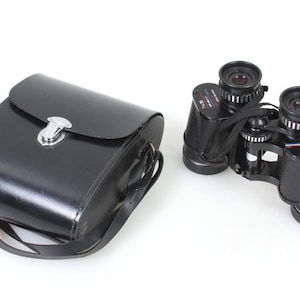 7x35 Binoculars With Front Caps And Case