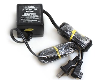 Sunpak ACアダプター AD-26 A、マルチ電圧 - 新品