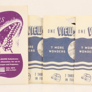 May include: Vintage View-Master reel set featuring "Butterflies of North America" with a purple and white cover. The set includes multiple reels with blue and white packaging, showcasing 3D images in full-color Kodachrome.