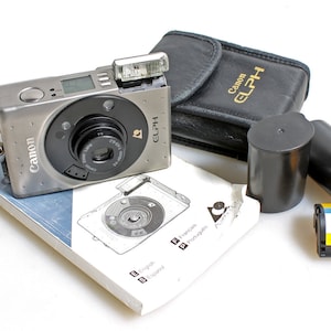 Canon Elph Film Camera in Case with Film and Manual