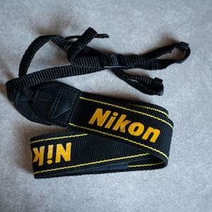 Pasek do aparatu Nikon - Nowy - Do filmów i aparatów cyfrowych
