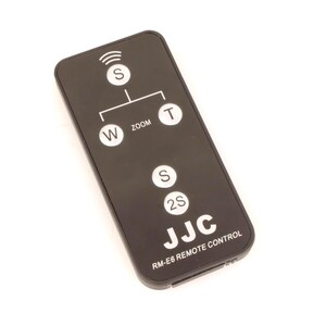 May include: A weathered wooden sign, inscribed with 'Welcome to our home' in a handwritten font. The sign has a distressed appearance, suggesting a vintage aesthetic, suitable for a front door or hallway.