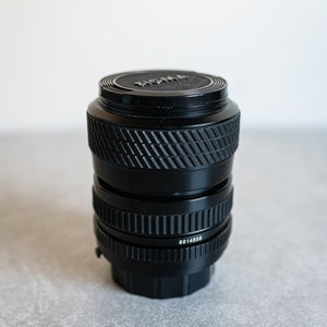 Tokina SZ-X 35-70mm f3.5-4.6 Zoom Lens for Minolta MD Mount w/ Caps