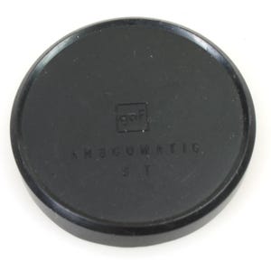 May include: Black lens cap with the text "AMSCOmatic ST" and the logo "goer" in a square.