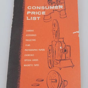 May include: A vintage 1961 Agfa consumer price list booklet with an orange cover and black spine. The front features blue line-art illustrations of a camera, binoculars, a film projector, and a lamp, with text listing cameras, accessories, projectors, films, photographic papers, chemicals, optical goods, and magnetic tapes.