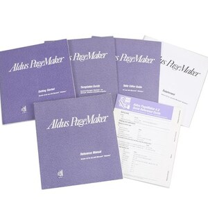 May include: A set of six purple Aldus PageMaker manuals, including a Getting Started guide, a Desktop Guide, a  Save-a-Lot Guide, a Reference Manual, and a Quick Reference Guide. The manuals are for Aldus PageMaker 3.0.