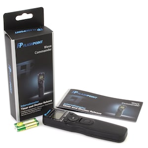 May include: Black Flashpoint Wave Commander intervalometer and shutter release with a digital display and buttons. The device is packaged in a black box with the Flashpoint logo and product name.