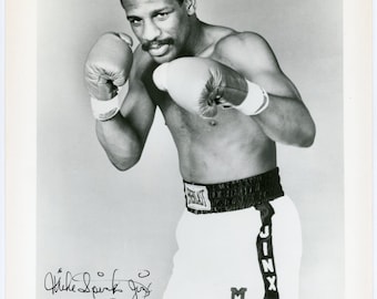 Signed Photo of Michael Spinks - Heavyweight Champion of the World