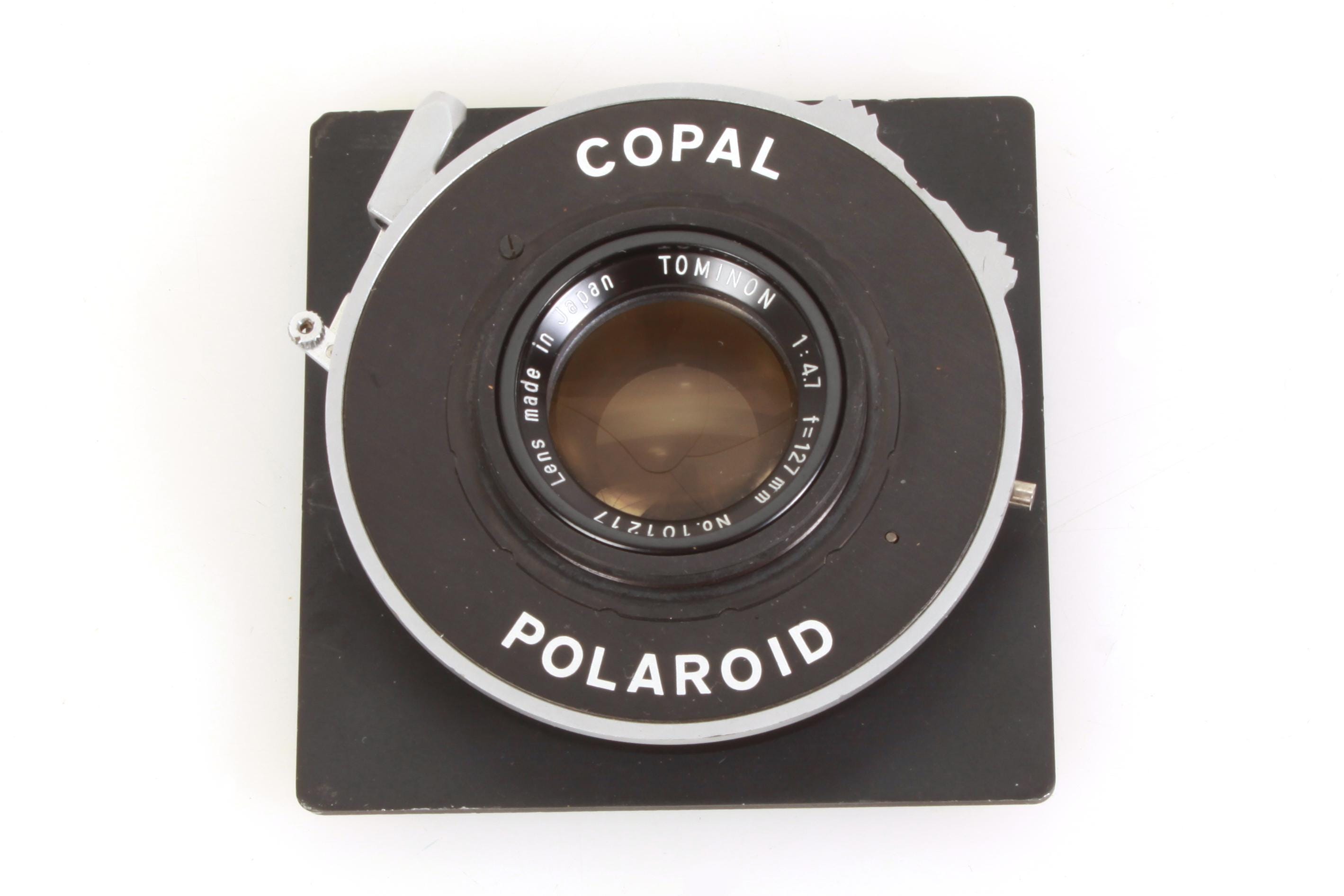 Tominon 127mm F4.7 Lens in Polaroid Copal Shutter W/ 3 5/8 Board