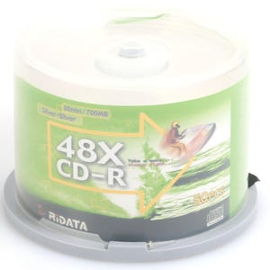 May include: A cylindrical container of 50 CD-Rs. The label is green and white, with the text "48X CD-R" and "80min/700MB". A graphic of a person surfing on a wave is also on the label. The brand name "RIDATA" is visible.