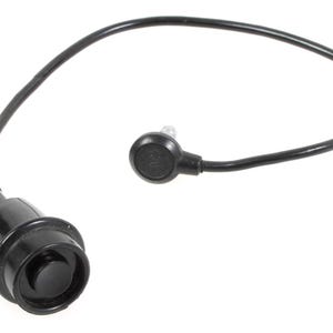 May include: A black electrical component with a button and a connecting wire. The component has a circular design with a button on one end and a smaller circular piece on the other end, connected by a flexible black wire.
