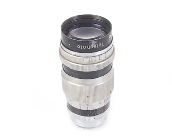 Soligor 135 mm F2.8-telelens voor Exakta met houder